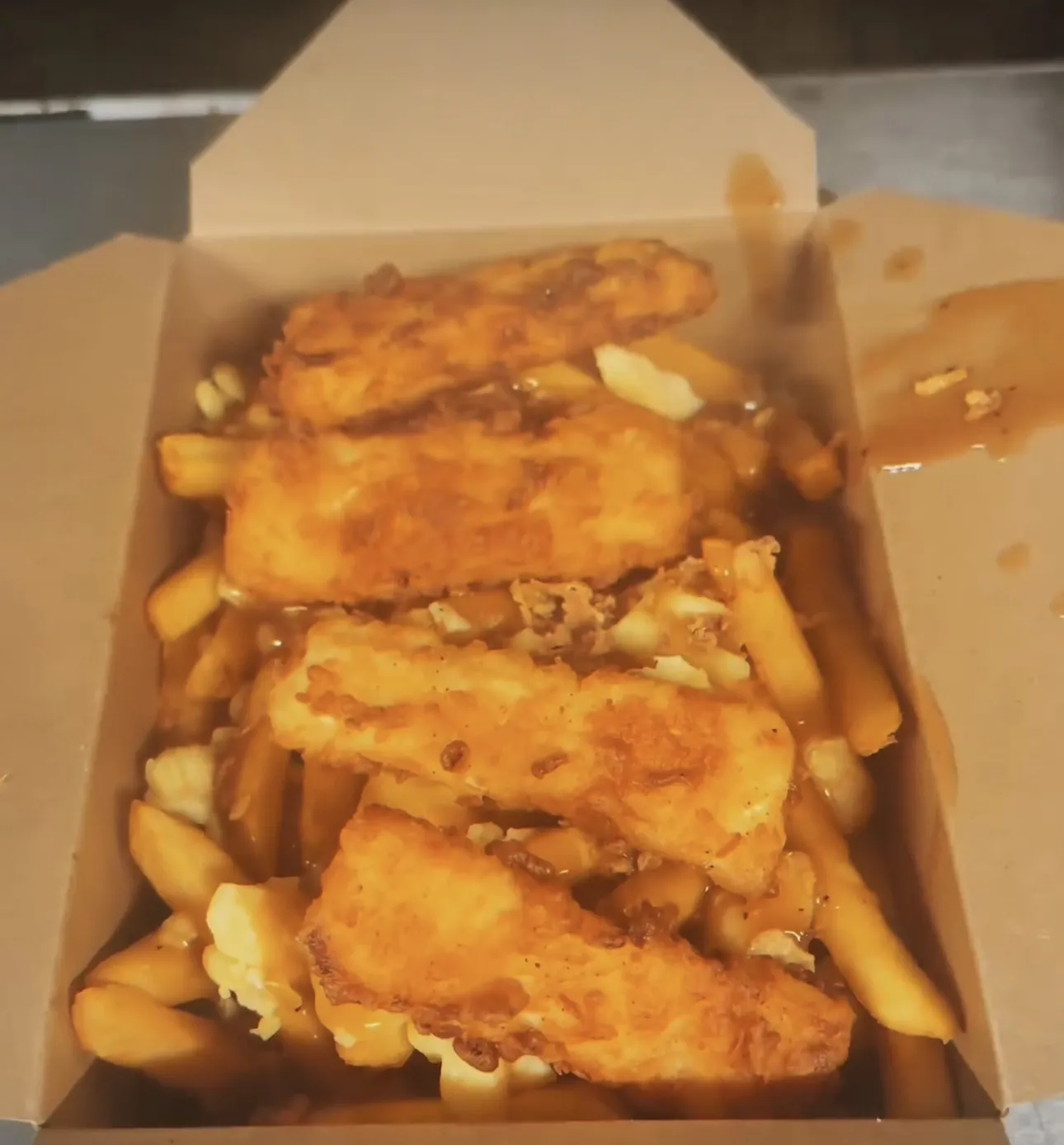 Chips loaded with halloumi and gravy