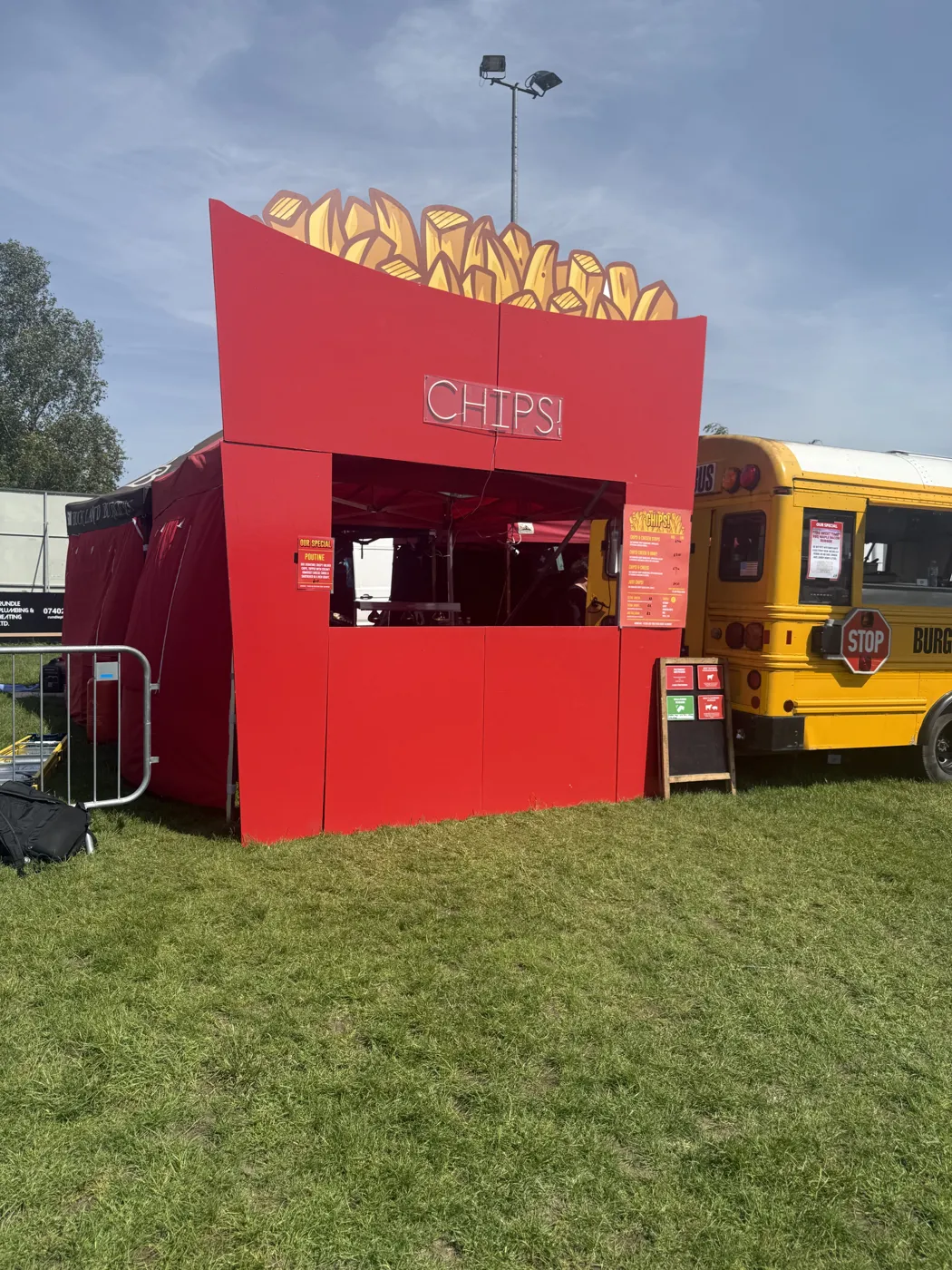 The CHIPS! stall set up beside the yellow Burger Bus